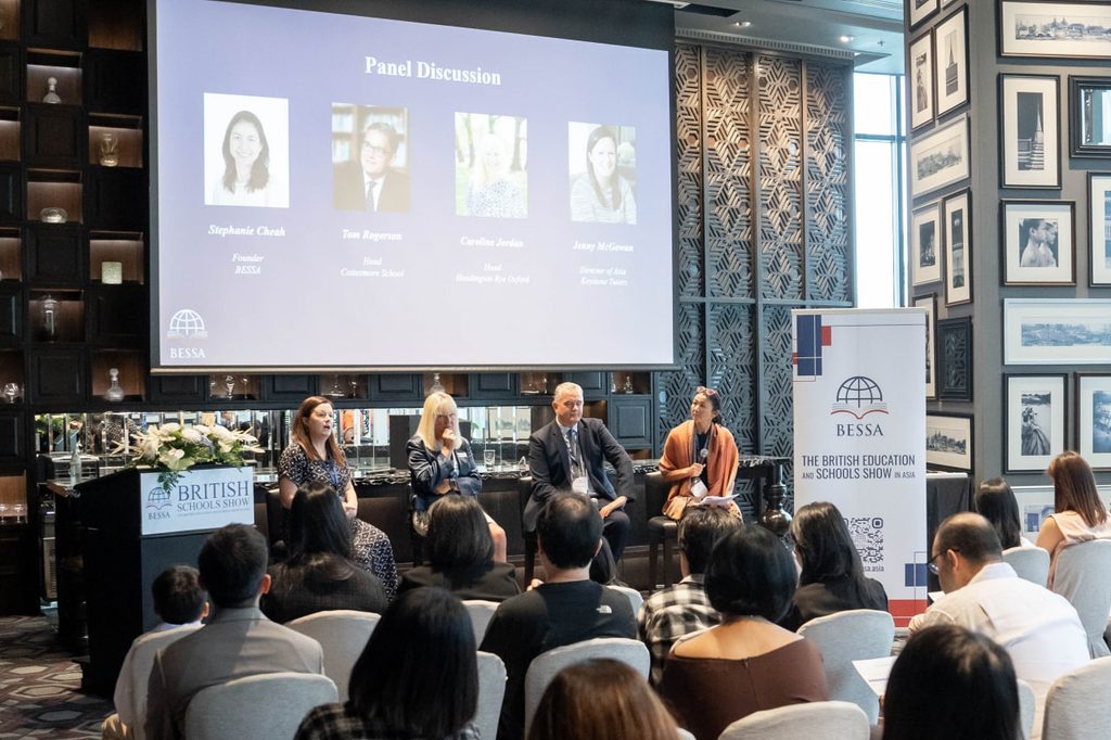 A panel discussion session at a BESSA Malaysia event featuring education experts addressing parents and attendees